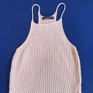 Brandy Melville, small light pink tank top.